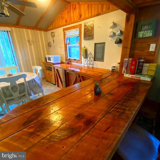 1074 White Pine Ln, Capon Bridge, WV 26711 - dining space with electric panel, ceiling fan, and vaulted ceiling