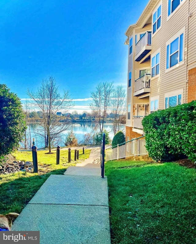 6541 Grange Ln Unit 401, Alexandria, VA 22315 - view of community featuring a water view and a lawn