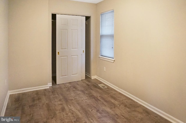 83 Walnut Ln, Pine Hill, NJ 08021 - unfurnished bedroom featuring wood finished floors and a closet
