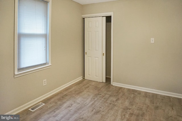 83 Walnut Ln, Pine Hill, NJ 08021 - unfurnished bedroom featuring wood finished floors and a closet