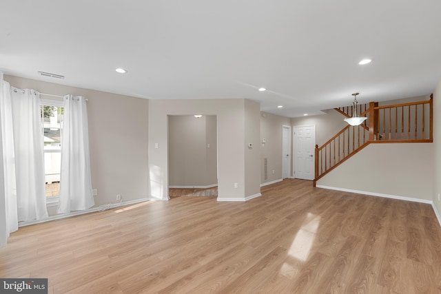26 Portsmouth Ct, Holland, PA 18966 - unfurnished living room with light wood-type flooring, recessed lighting, and stairway