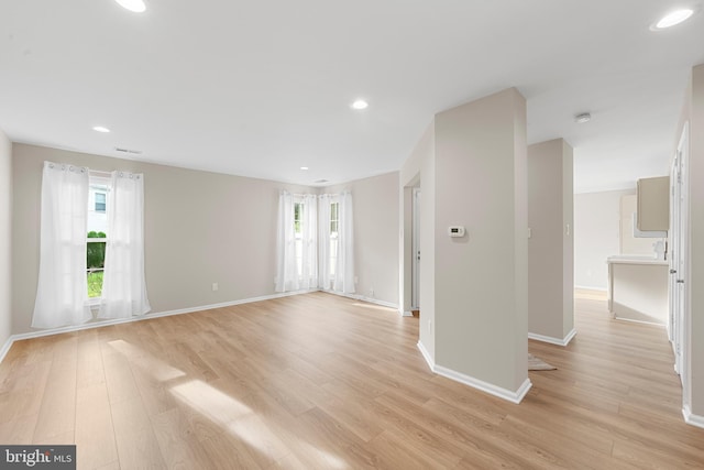 26 Portsmouth Ct, Holland, PA 18966 - empty room with light wood-style flooring, plenty of natural light, recessed lighting, and a smoke detector