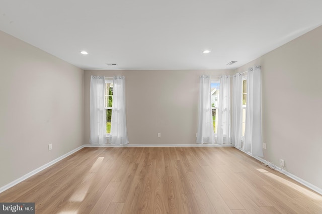 26 Portsmouth Ct, Holland, PA 18966 - empty room with light wood finished floors and recessed lighting
