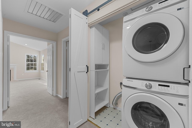 26 Portsmouth Ct, Holland, PA 18966 - laundry area with stacked washing machine and dryer and light carpet