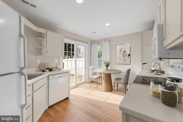 26 Portsmouth Ct, Holland, PA 18966 - kitchen with white appliances, open shelves, recessed lighting, light wood-style floors, and light countertops