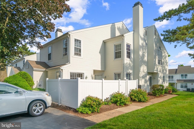 26 Portsmouth Ct, Holland, PA 18966 - view of side of home with a chimney