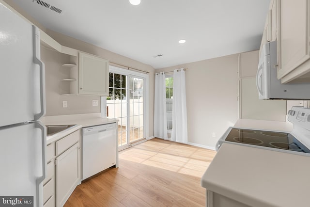 26 Portsmouth Ct, Holland, PA 18966 - kitchen with white appliances, open shelves, light wood-type flooring, recessed lighting, and light countertops