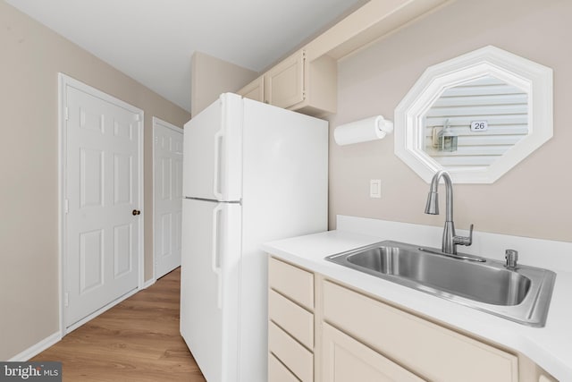26 Portsmouth Ct, Holland, PA 18966 - kitchen featuring freestanding refrigerator, light countertops, and light wood-style floors