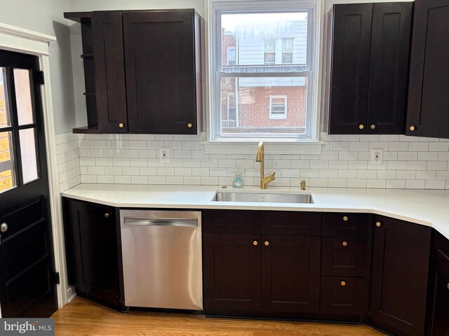 643 Jamestown Ave, Philadelphia, PA 19128 - kitchen featuring dishwasher, open shelves, light countertops, and decorative backsplash