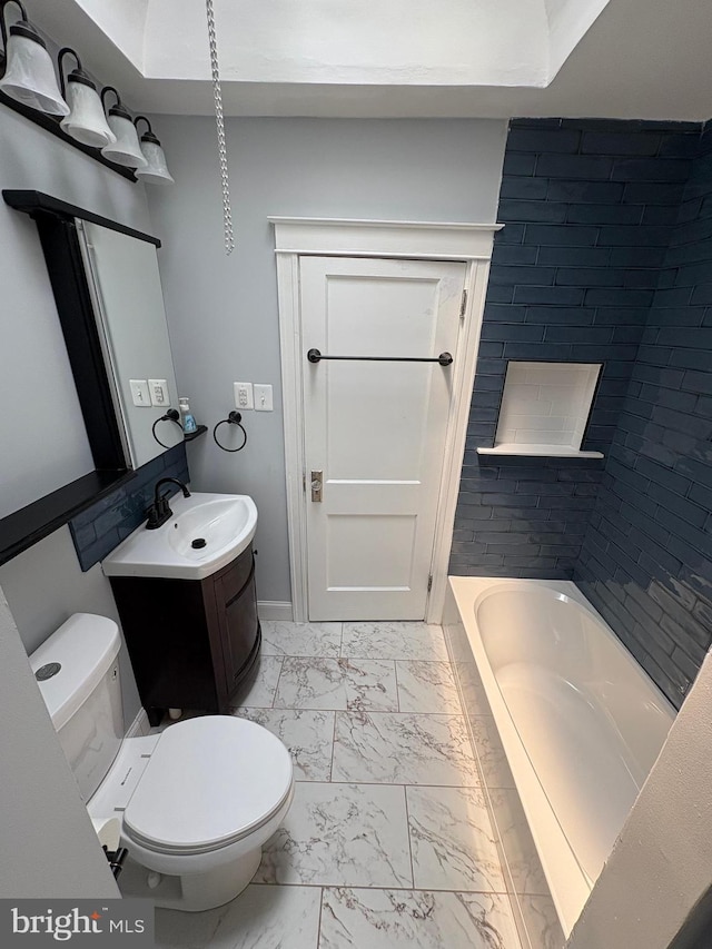 643 Jamestown Ave, Philadelphia, PA 19128 - full bath with marble look tiles, a bath, and vanity
