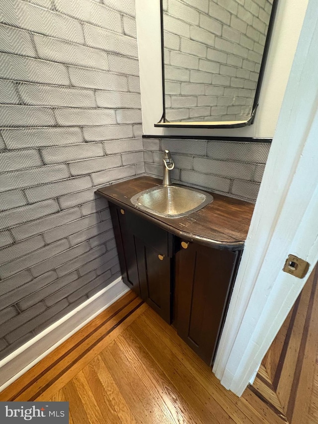 643 Jamestown Ave, Philadelphia, PA 19128 - half bath featuring vanity and wood finished floors