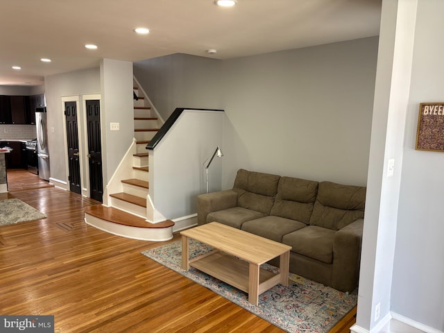 643 Jamestown Ave, Philadelphia, PA 19128 - living room featuring wood finished floors, stairway, and recessed lighting