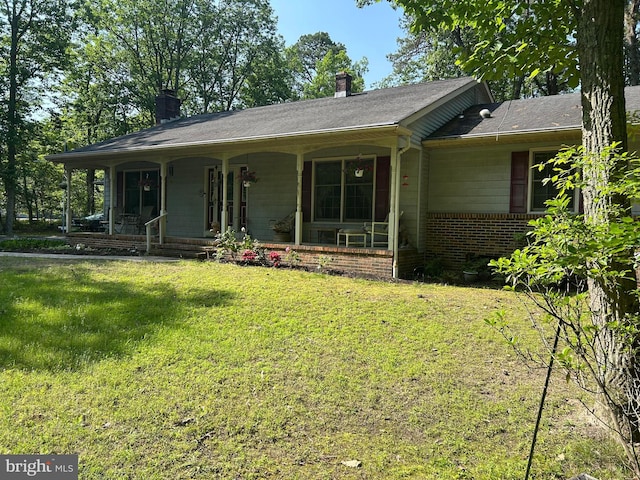 13 Mark Ln, Tabernacle, NJ 08088 - ranch-style home featuring covered porch, a chimney, brick siding, and a front lawn