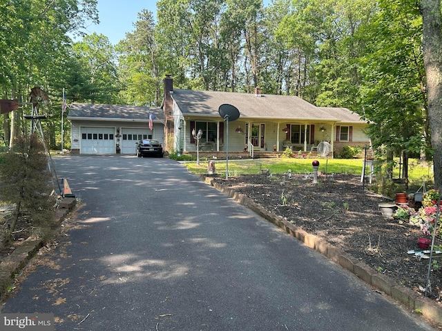 13 Mark Ln, Tabernacle, NJ 08088 - ranch-style home with a garage, driveway, a porch, and a chimney