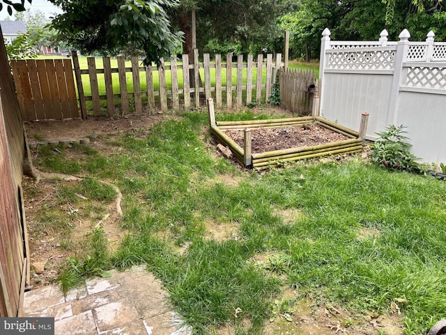 311 Ash Hollow Dr, Winchester, VA 22602 - view of yard featuring a vegetable garden
