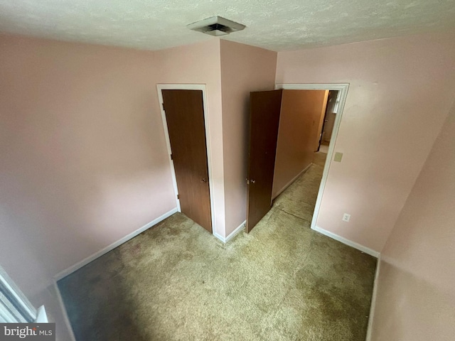 311 Ash Hollow Dr, Winchester, VA 22602 - unfurnished bedroom with carpet and a textured ceiling