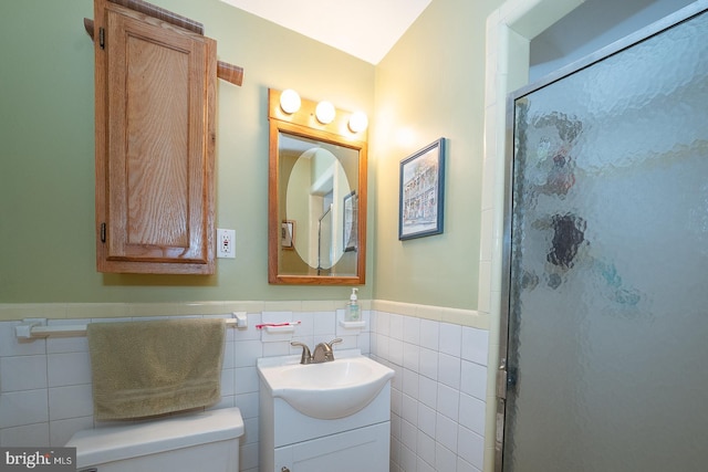 643 Crestwood Rd, Wayne, PA 19087 - full bath with vanity, tile walls, a stall shower, and wainscoting