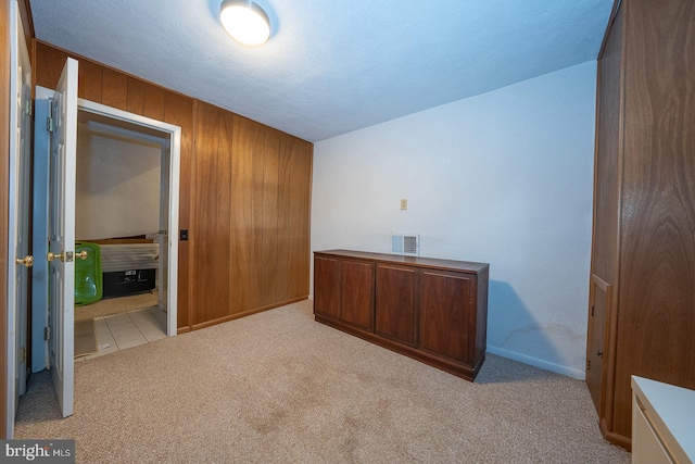 643 Crestwood Rd, Wayne, PA 19087 - carpeted spare room featuring wooden walls and baseboards