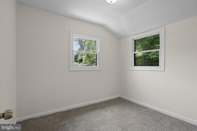 618 Cabin Branch Dr, Capitol Heights, MD 20743 - spare room featuring vaulted ceiling and carpet
