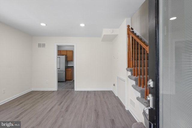 618 Cabin Branch Dr, Capitol Heights, MD 20743 - entrance foyer with stairs, wood finished floors, and recessed lighting