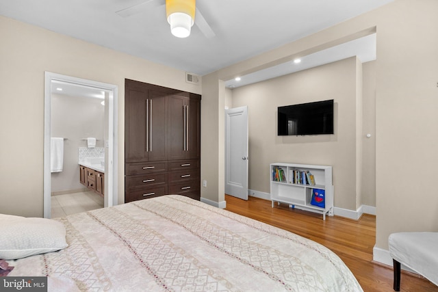 2815 39th St NW, Washington, DC 20007 - bedroom with light wood-style flooring, ensuite bath, recessed lighting, and ceiling fan