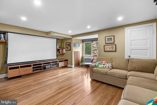 2815 39th St NW, Washington, DC 20007 - cinema with radiator, light wood-style floors, and recessed lighting