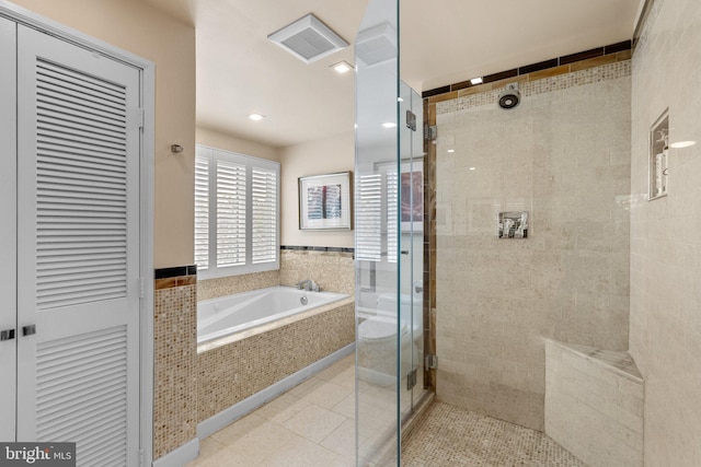2815 39th St NW, Washington, DC 20007 - full bathroom with a stall shower, a garden tub, tile patterned floors, recessed lighting, and a closet