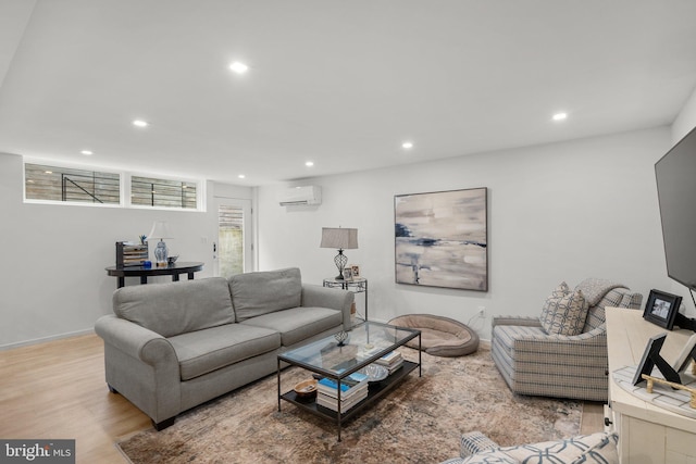 2815 39th St NW, Washington, DC 20007 - living room with recessed lighting, an AC wall unit, and light wood-style floors