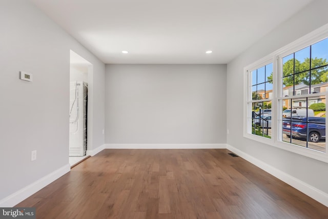 902 Nadine Ct, Landover, MD 20785 - empty room with wood finished floors and recessed lighting