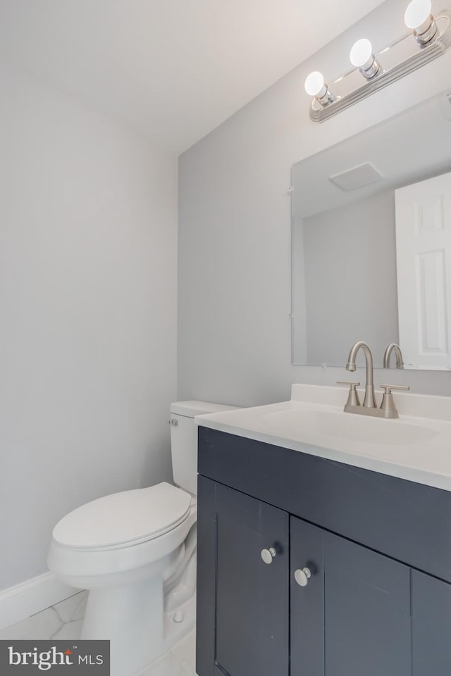 902 Nadine Ct, Landover, MD 20785 - bathroom with vanity and marble look tiles