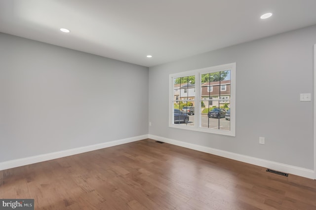 902 Nadine Ct, Landover, MD 20785 - spare room with wood finished floors and recessed lighting