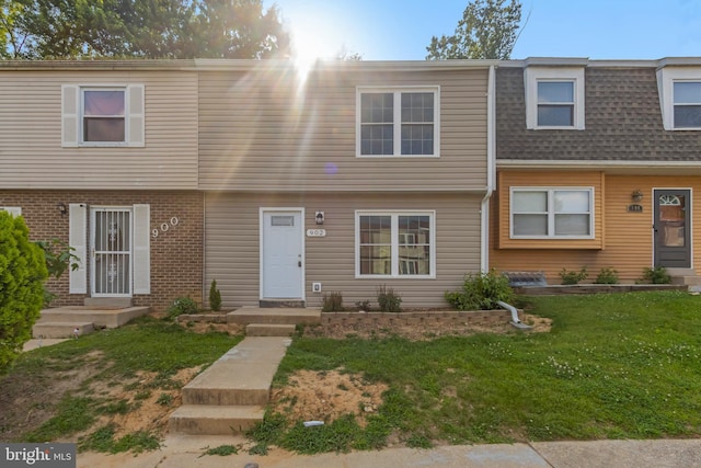 902 Nadine Ct, Landover, MD 20785 - view of property with a front yard and roof with shingles
