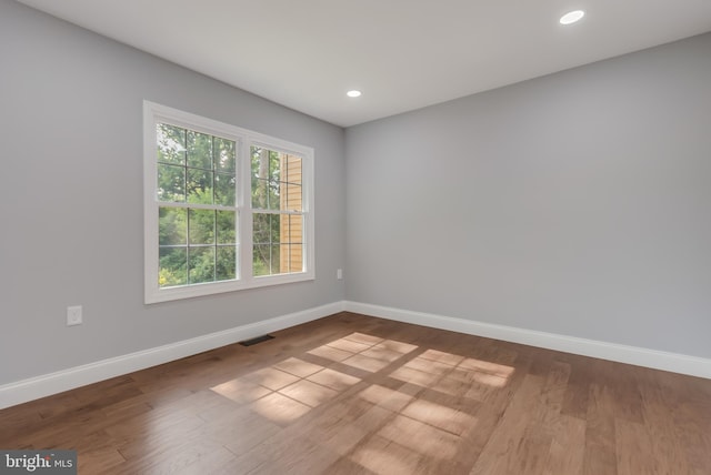 902 Nadine Ct, Landover, MD 20785 - spare room with wood finished floors and recessed lighting