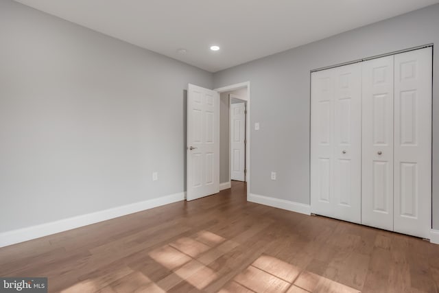 902 Nadine Ct, Landover, MD 20785 - unfurnished bedroom featuring wood finished floors, recessed lighting, and a closet