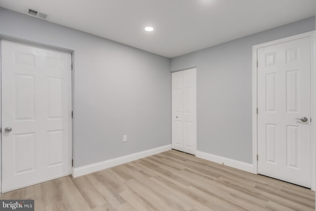 902 Nadine Ct, Landover, MD 20785 - unfurnished bedroom featuring light wood-style flooring, recessed lighting, and a closet