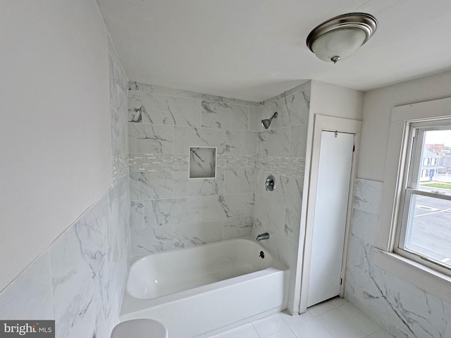 112 Dorman St, Harrington, DE 19952 - bathroom with shower / bathtub combination, tile walls, and tile patterned floors