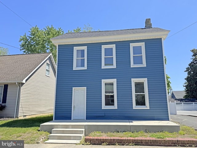 112 Dorman St, Harrington, DE 19952 - view of front of house with a chimney