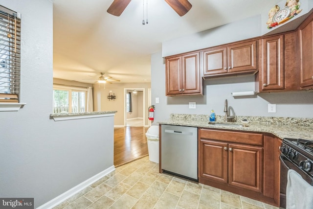 1043 Tristram Cir, Mantua, NJ 08051 - kitchen with dishwasher, ceiling fan, black gas range oven, and light stone countertops
