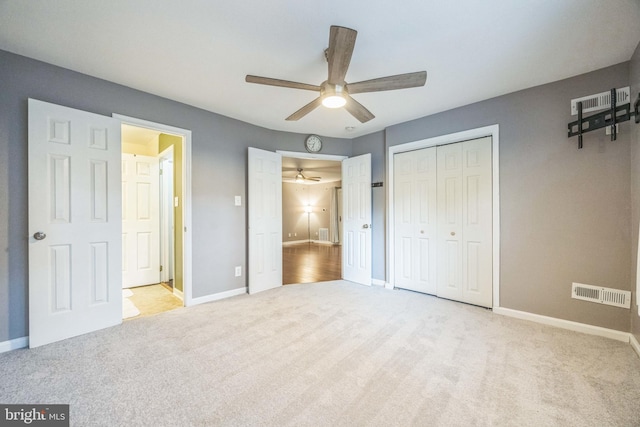 1043 Tristram Cir, Mantua, NJ 08051 - unfurnished bedroom featuring carpet, a closet, and ceiling fan