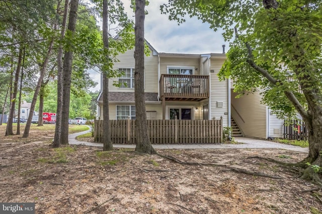 1043 Tristram Cir, Mantua, NJ 08051 - rear view of property with a balcony and stairs