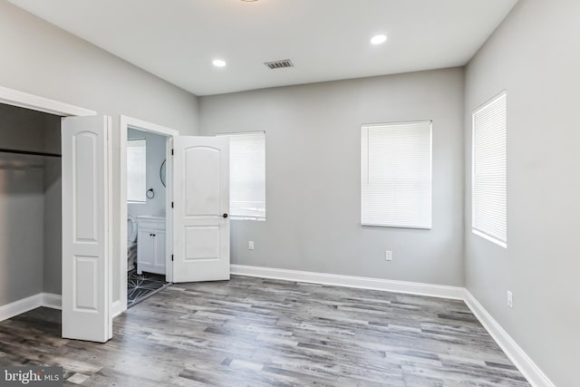 4219 Granada Ave, Baltimore, MD 21215 - unfurnished bedroom with wood finished floors and recessed lighting