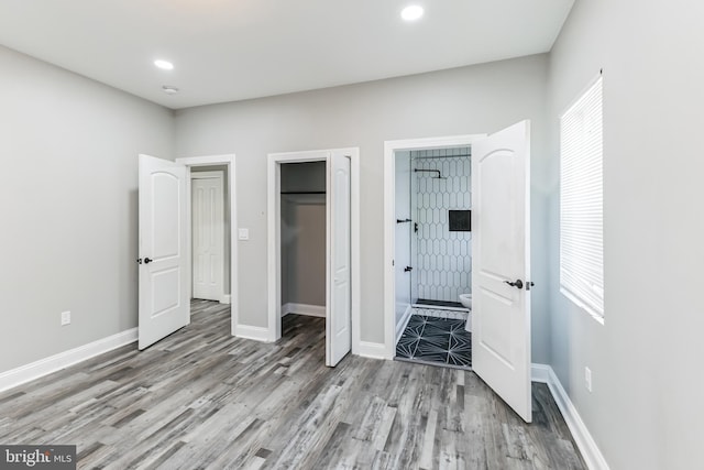 4219 Granada Ave, Baltimore, MD 21215 - unfurnished bedroom featuring wood finished floors, recessed lighting, a closet, and ensuite bathroom