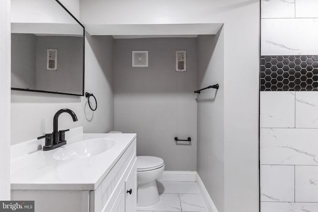4219 Granada Ave, Baltimore, MD 21215 - bathroom featuring marble look tile flooring and vanity
