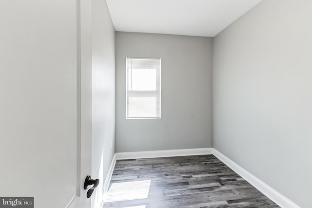 4219 Granada Ave, Baltimore, MD 21215 - spare room with wood finished floors and baseboards