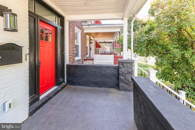 4219 Granada Ave, Baltimore, MD 21215 - doorway to property featuring a porch