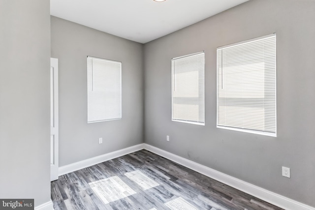 4219 Granada Ave, Baltimore, MD 21215 - spare room featuring dark wood-type flooring