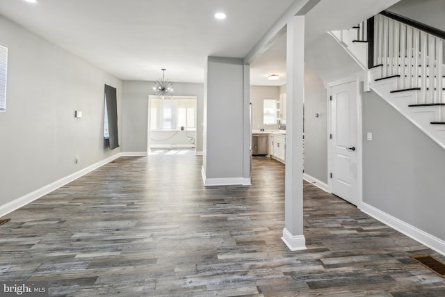 4219 Granada Ave, Baltimore, MD 21215 - unfurnished living room with a chandelier, dark wood-style flooring, stairway, and recessed lighting