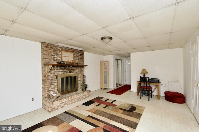 12518 Tove Rd, Clinton, MD 20735 - living room with a drop ceiling and a brick fireplace