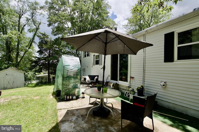 12518 Tove Rd, Clinton, MD 20735 - view of patio featuring a storage shed