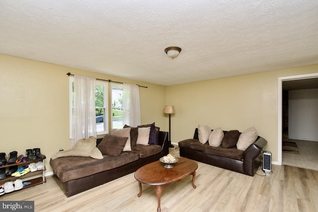 12518 Tove Rd, Clinton, MD 20735 - living room with wood finished floors and a textured ceiling